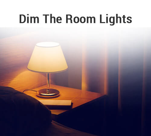 Dim the room lights